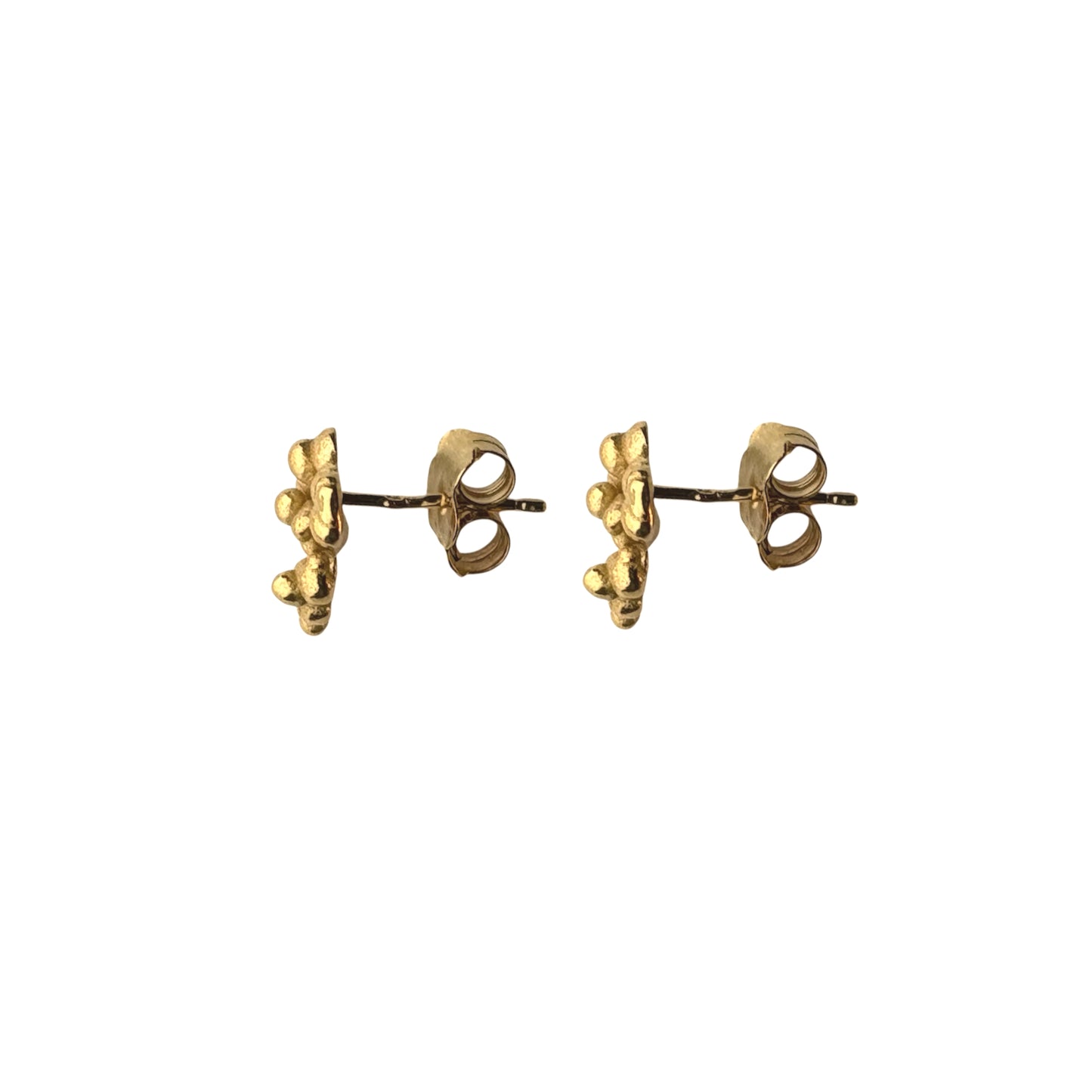 Close-up texture of gold-plated silver stud earrings with organic drop detail