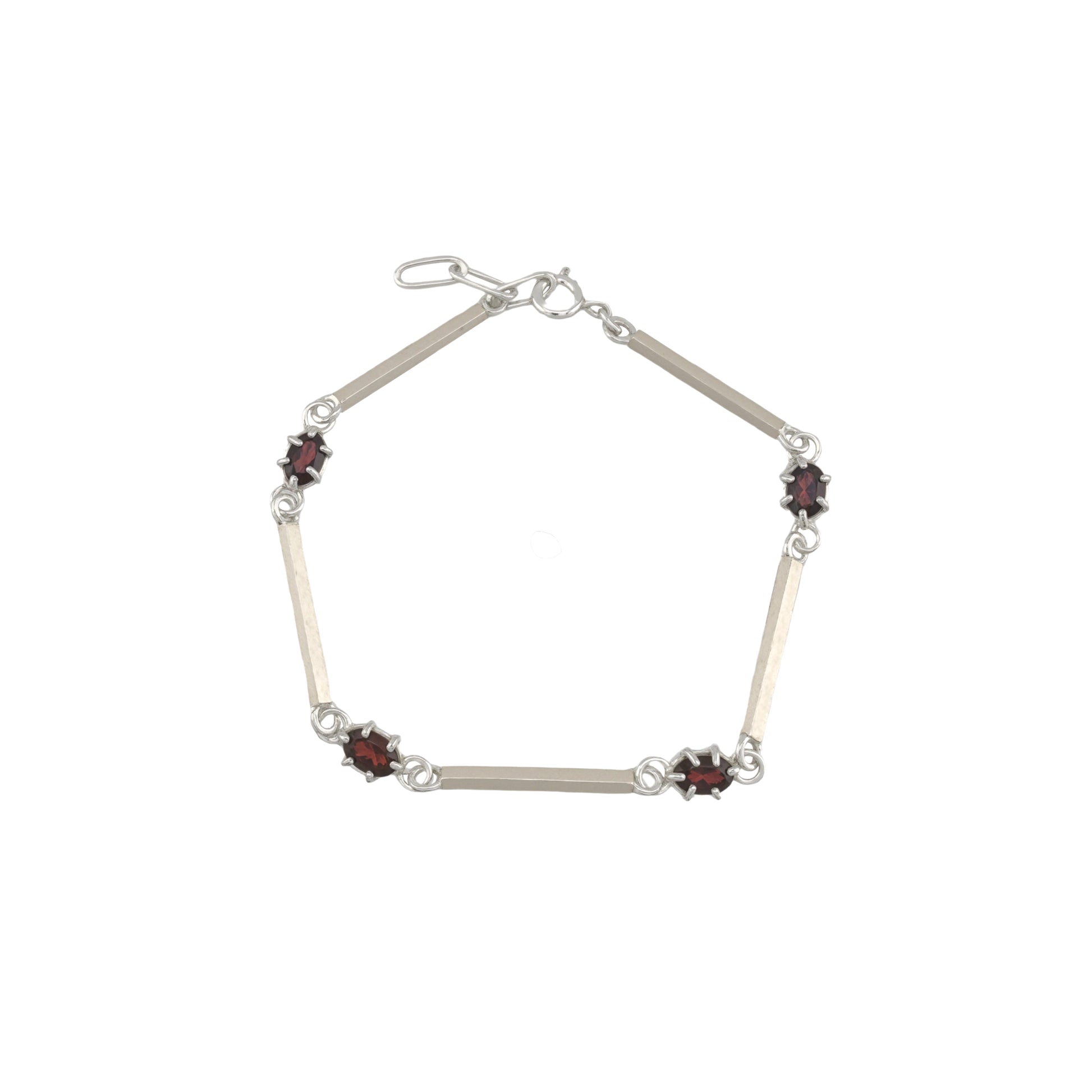 Silver bracelet with red gemstones on a white background