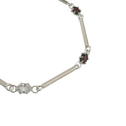Silver unisex bracelet with gemstone accents on stone settings