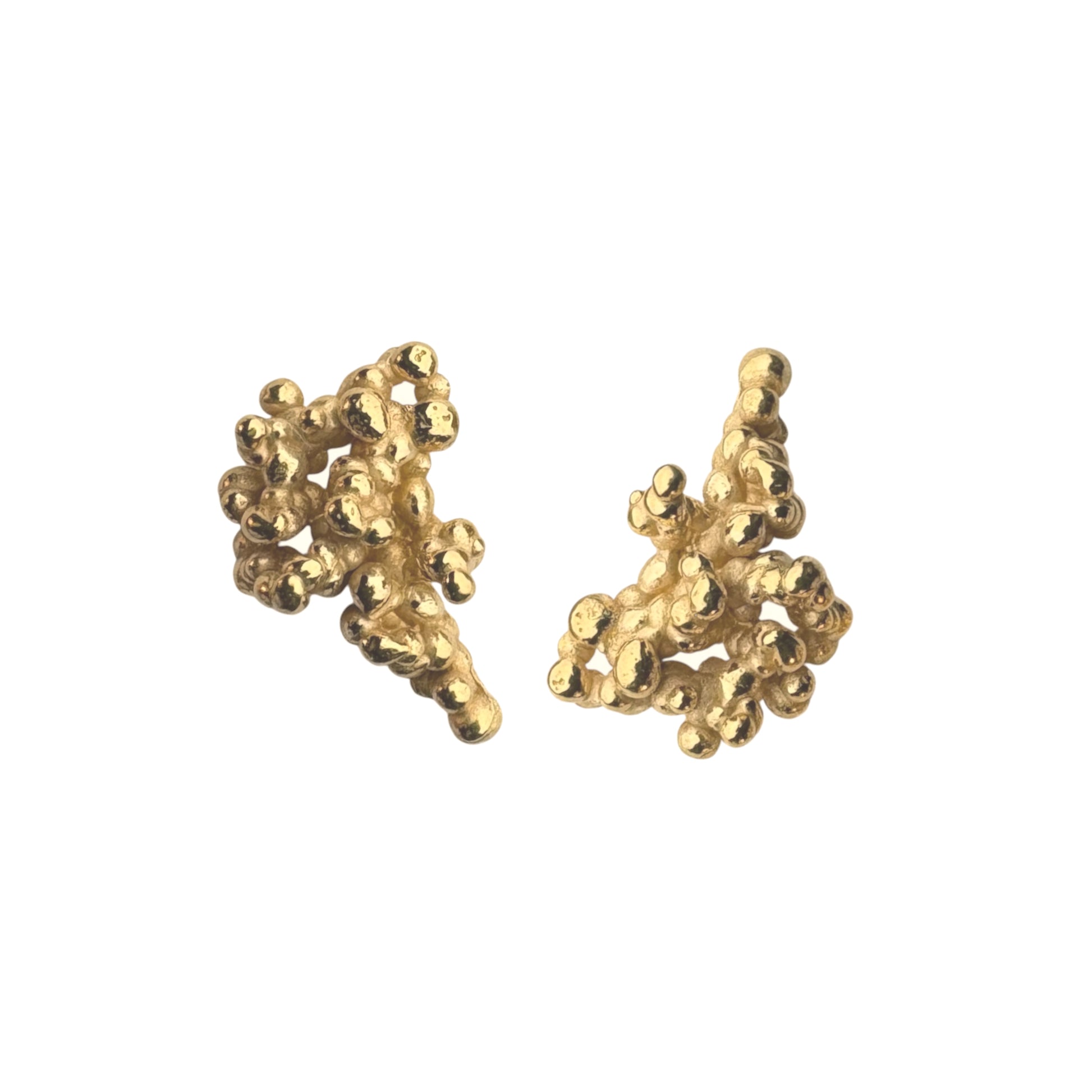Golden coral-shaped earrings on a white background