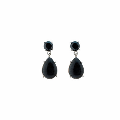 Pair of black teardrop earrings on a white background