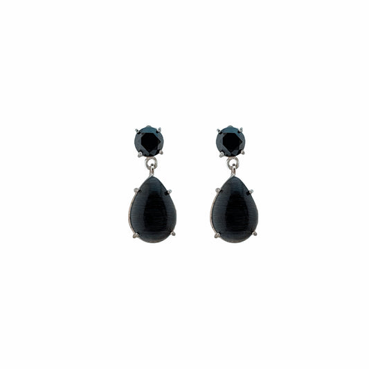 Pair of black teardrop earrings on a white background