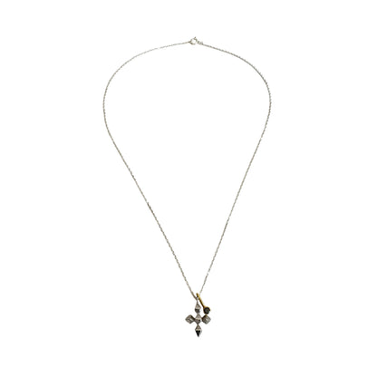 Necklace with a cross pendant on a white background