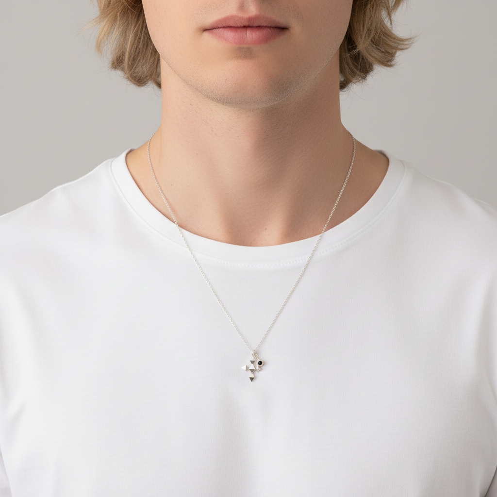 men in white t-shirt with a necklace with silver pendant