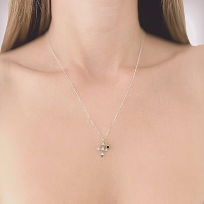 Unisex silver chain with geometric cross and golden pendants with black stone.