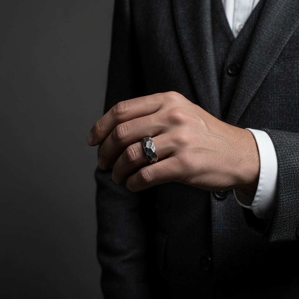 Male sofisticated model wearing silver rock ring